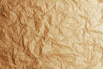 Crumpled brown kraft paper texture or background