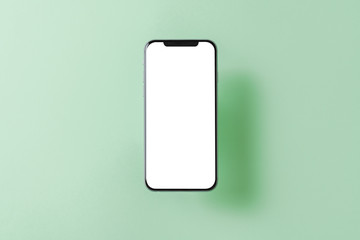 Smartphone mockup. New black frameless hovering smartphone with white screen. Isolated on color...