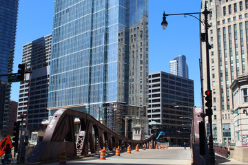 Orleans Street Bridge over the Chicago River with orange construction barrels