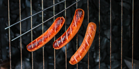 grilled sausages, charcoal bbq menu concept. food background. top view copy space for text