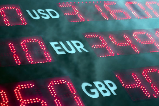 Scoreboard with different currencies exchange rates. United States Dollar, Euro and Great Britain Pound exchange rates. - Powered by Adobe