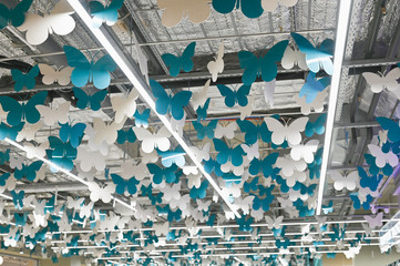 butterfly ceiling. Ceiling with a lot of butterflies, mall