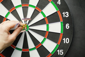 Darts. The dart for playing in the game board is stuck. Hit the sector in darts. The concept of a...