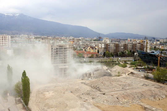 Controlled explosion with blasts of a unfinished and abandoned empty high building, printing press house IPK Rodina, in Sofia, Bulgaria on 04/26/2020.