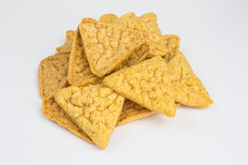 healthy snack of baked, not fried chickpea chips with yogurt and cucumber flavor