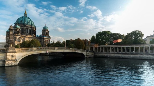 Berliner dom timelapse with moving clouds and boats. Berlin, Germany 2019