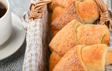 Sweet homemade cottage cheese buns with sugar and coffee cup
