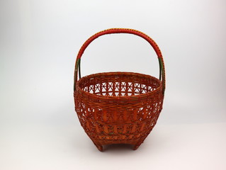 Thai bamboo basket Isolated on a white background.