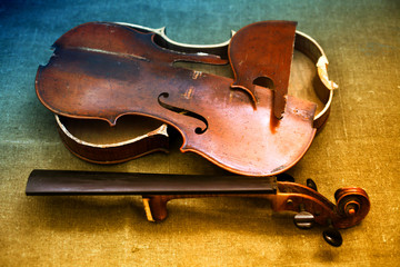 Old broken violin, rainbow tinted