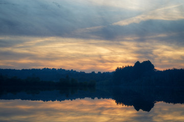 Moody atmosphere at sunset over a lagoon