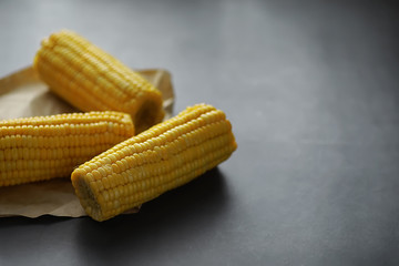 Freshly made fragrant ear of corn with salt. Farm snack of fresh corn. Healthy breakfast and healthy lifestyle concept.