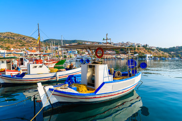 Fototapeta na wymiar Beautiful traditional fishing boats in Pythagorion, Samos island, Greece