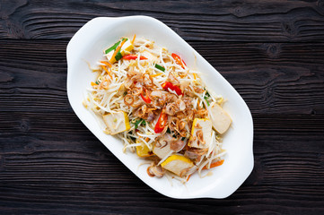 Stir Fried Bean Sprouts with tofu and scallion. Asian vegetable stir fry