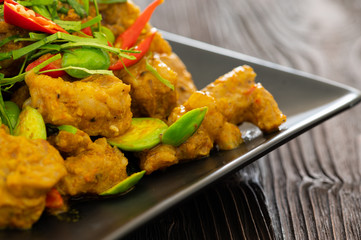 Stir Fried Pork Ribs Red Curry Paste And Coconut Milk.