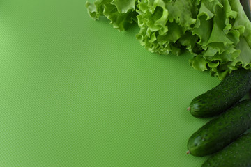 cucumbers on a wooden background