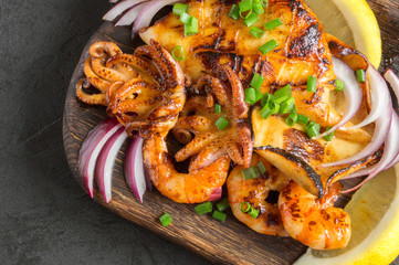 spicy fried seafood in sauce.