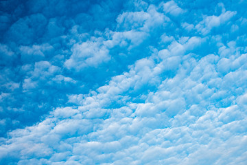 Fototapeta na wymiar Scenic cloudscape of summer morning with clouds on blue sky