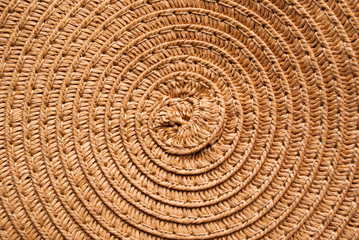 Naklejka premium ethnic bag with weaving, round vines, with fabric ribbons, accessories. texture, background