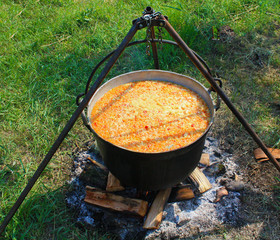 food prepared in a cauldron
