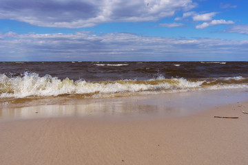 Waves on beach on Kyiv Sea, spring