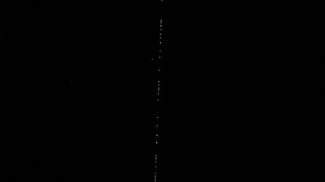 starlink satellites of elon musk's spacex project that travel the sky passing under venus, satellites to transmit the internet, broadband, global connection
