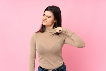 Obraz premium Young woman over isolated pink background with tired and sick expression