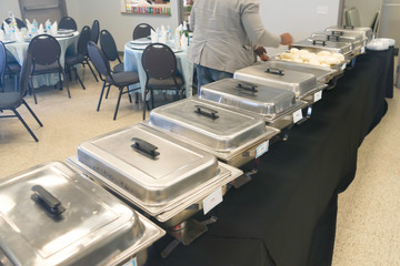 Chaffing dishes to serve food at a Nigerian party