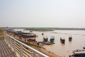 Fototapeta na wymiar Boat on the river. Floating Village on Tonlesap Lake in Cambodia