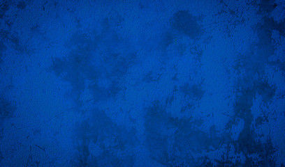Abstract grunge decor. Beautiful dark blue stucco wall background. Space for designing and inserting text.