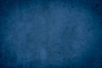 Fototapeta na wymiar Abstract grunge decor. Beautiful dark blue stucco wall background. Space for designing and inserting text.