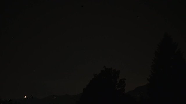 starlink satellites of elon musk's spacex project that travel the sky passing under venus, satellites to transmit the internet, broadband, global connection
