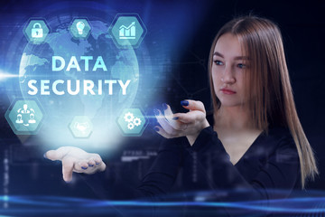 Business, Technology, Internet and network concept. Young businessman working on a virtual screen of the future and sees the inscription: Data security