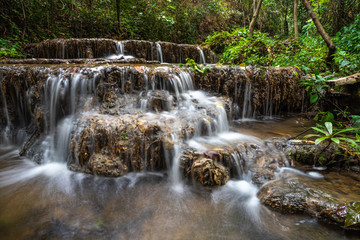 Fototapeta na wymiar Landscape photo, Huay Ton Phung Waterfall, beautiful waterfall in deep forest at Phayao province, Thailand