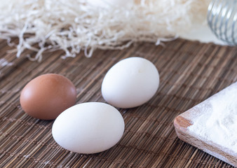 Close up view of raw chicken eggs. Background