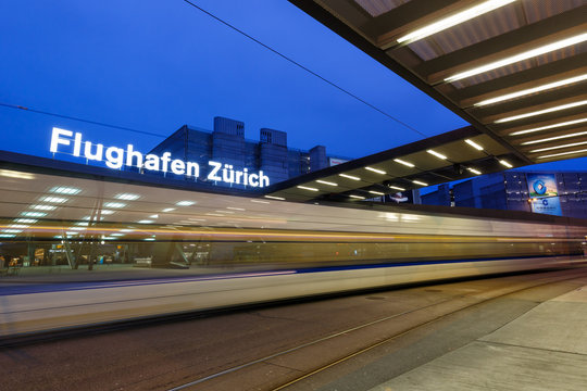 Zurich Airport ZRH with tram at night