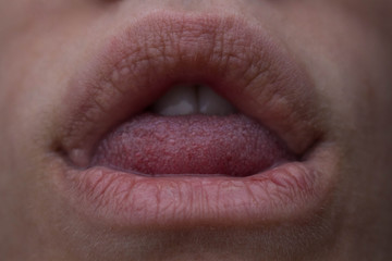 Obraz premium macro photo of the lips and a tongue