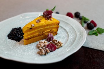 dessert on the plate with berries