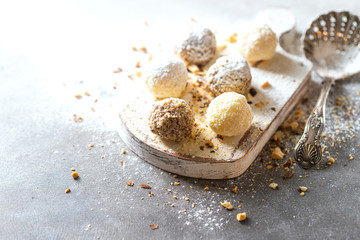 Vegan dessert, raw oatmeal nuts fruit bites prepared with natural ingredients.