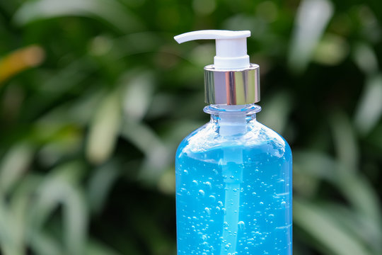 lcohol gel and sanitizer hand gel cleaners for anti Bacteria and virus on White Background, People using alcohol gel to wash hands to prevent COVID-19 virus.  COVID-19 protection.