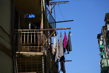 washed clothes hanging on ropes between houses in Batumi Georgia