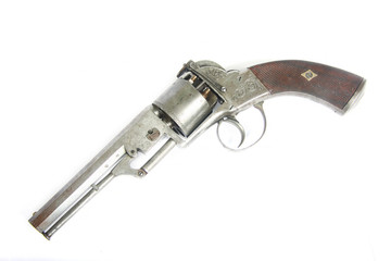 XIX century old rare muzzle loading percussion cap revolver pistol isolated on white background