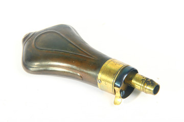 Old antique gunpowder flask isolated on white background