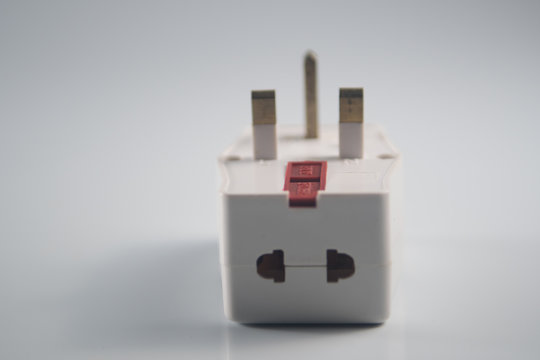 Three way electric socket isolated on white background