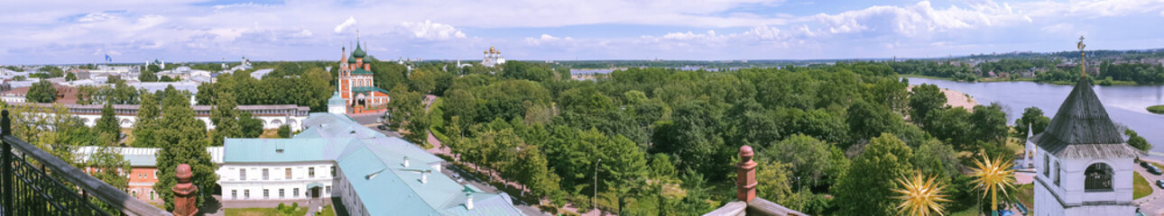 View of the Church of St. Michael the Archangel and the assumption Cathedral through the round window of the belfry of the Transfiguration monastery.