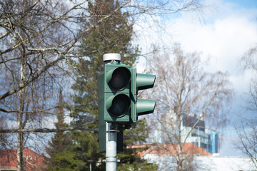 Not working traffic light with a pedestrian crossing.