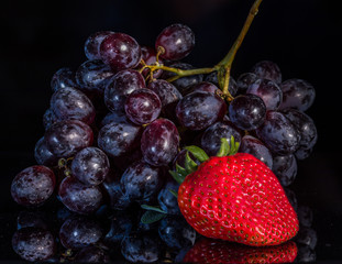 berries on a black background