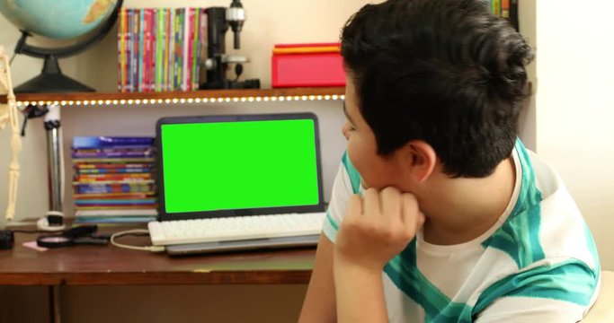Distance Education At Home With Green Screen Laptop Monitor