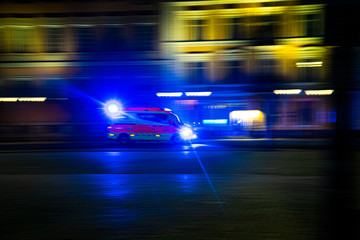 Fototapeta na wymiar An ambulance responding in Helsinki