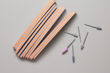 Set of professional manicure tools. Set of nail files Isolated on a gray background. Manicure and pedicure tools. Cosmetic products for manicurists.