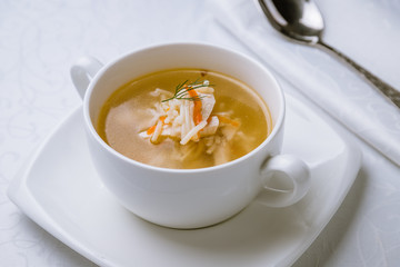 Chicken soup bouillon in a plate